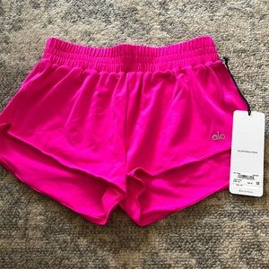 ALO Neon Pink Dolphin Shorts